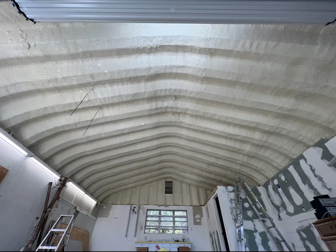 Spray polyurethane foam applied to the underside of a metal roof deck in Rowland Heights